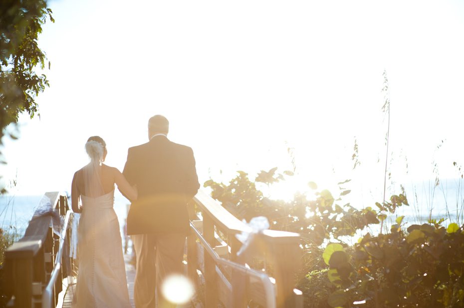 bride and dad walking down the aisle