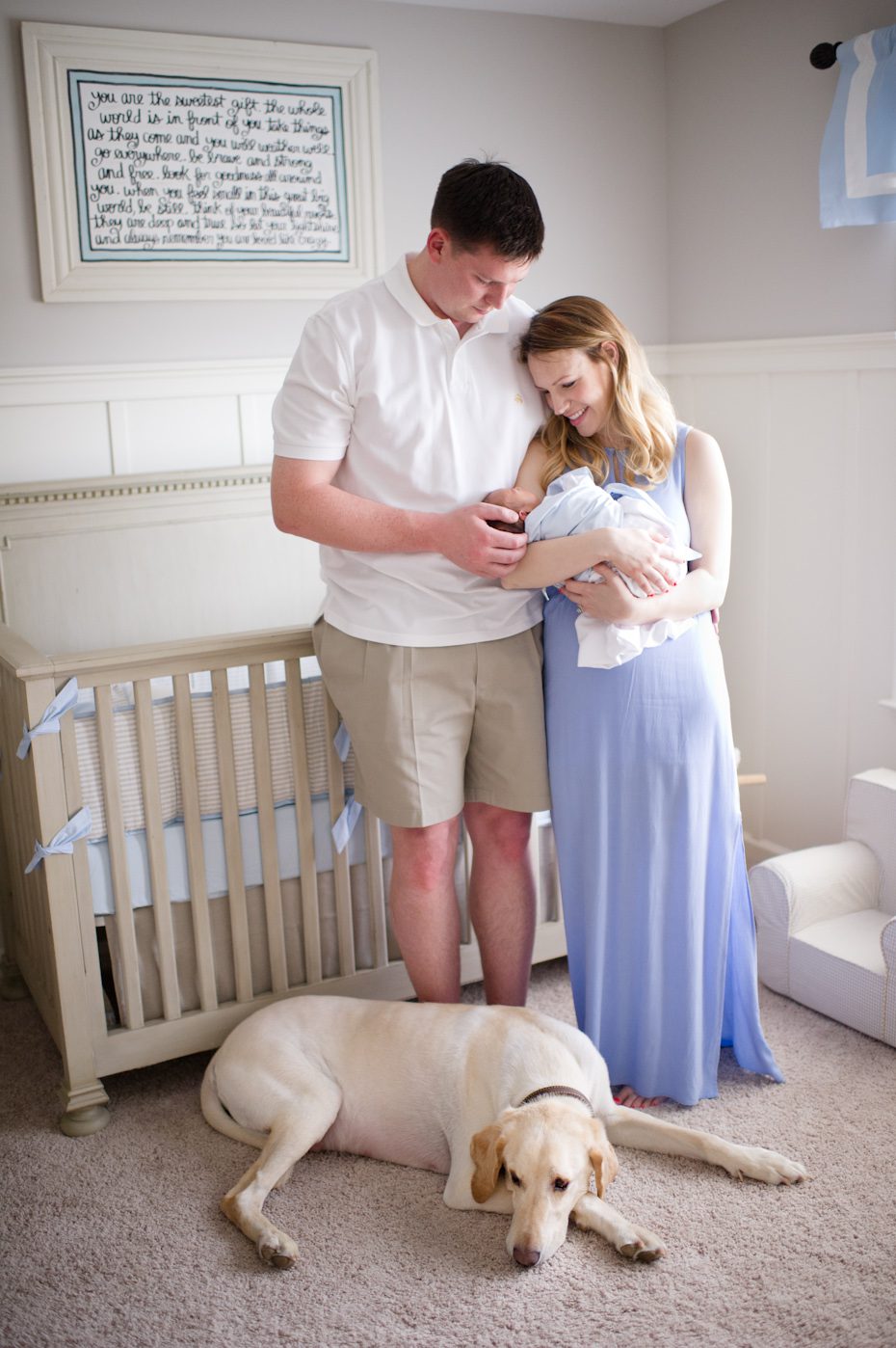 Newborn with family and dog